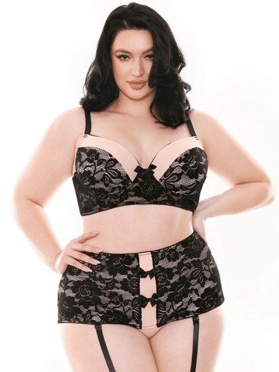 Plus size high wait black floral lace panty overlayed pink petal microfiber with pink petal center panel and removable garter straps. Molded cup black lace and pink petal bra with satin bow. Sensual Sinsations